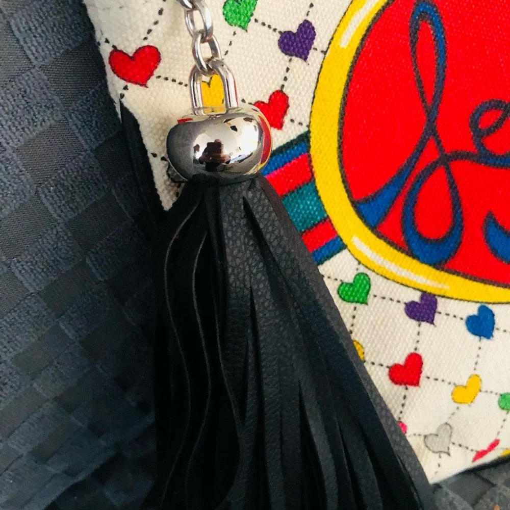 BRIGHTON Collectors*CROSSBODY w/LOVE & JOY BOW design and black tassel NWOT.